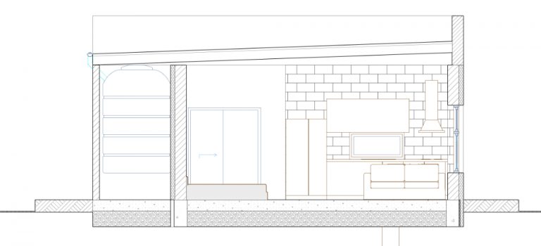 Cross-section drawing of an ADU with kitchen wall, built-in shelving and slab foundation