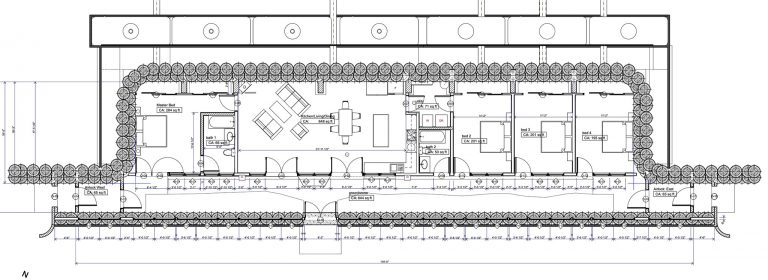 Floor plan of a four-bedroom off-grid home with garage