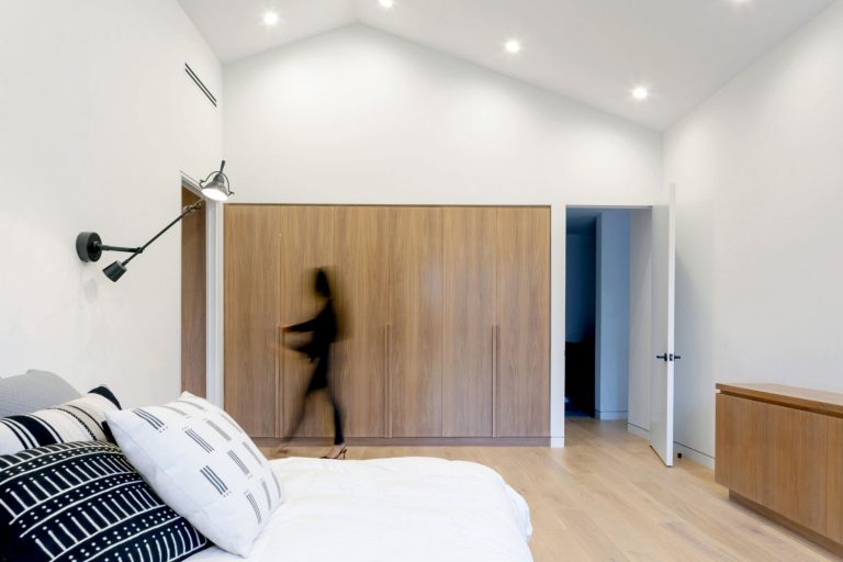 Morningside Remodel bedroom with vaulted ceiling and oak built-ins